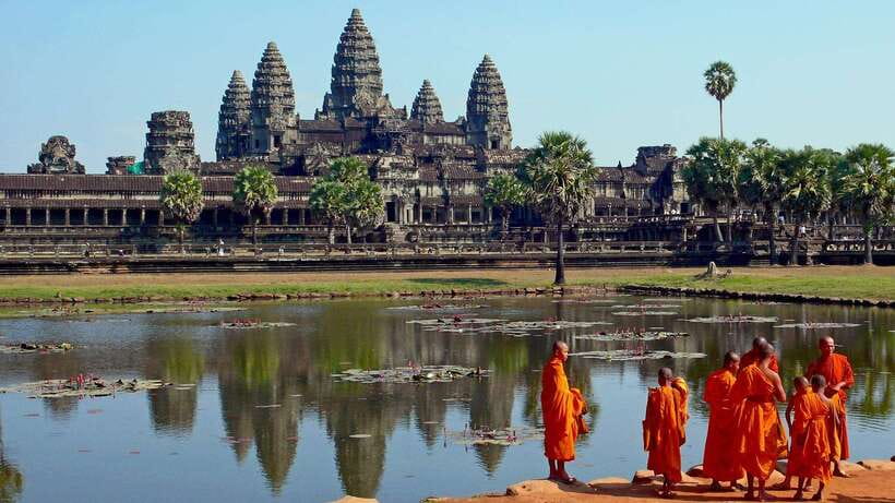Angkor Wat: 2-Day Sunrise and Floating Village Tour - Angkor Thom: Bayon, Baphoun, and royal stone faces