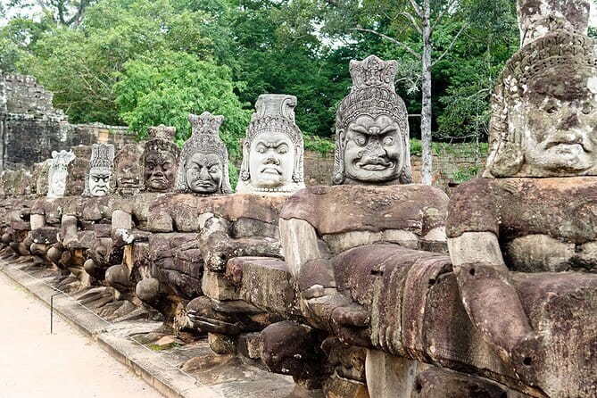 Angkor Wat 2-Day Tour from Bangkok - Bayon’s stone faces and Ta Prohm’s tree roots