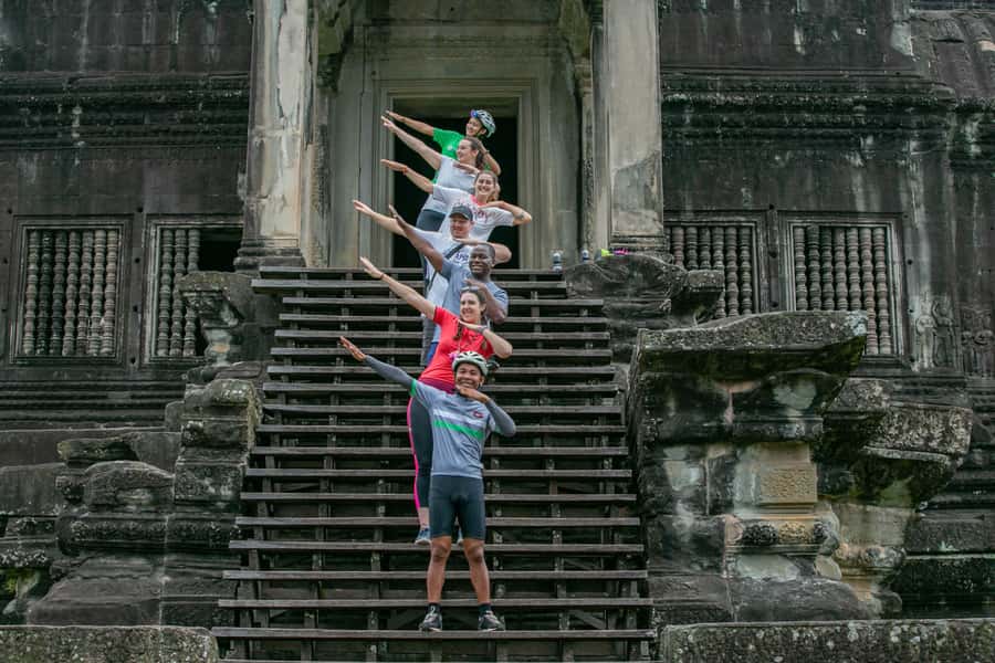 Angkor Wat: Guided Sunrise Bike Tour w/ Breakfast and Lunch - Guides, group size, and the human side