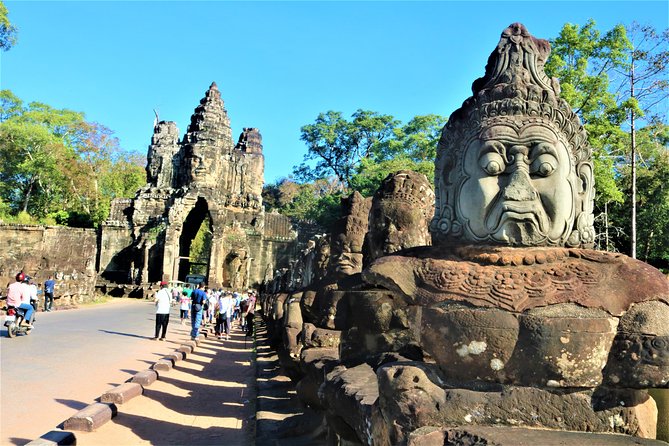 Angkor Wat Highlights and Sunrise Guided Tour from Siem Reap - Angkor Thom’s gates and royal scale