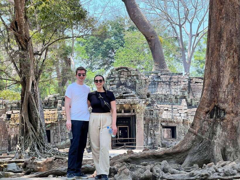 Angkor Wat Sunrise Bike Tour With Lunch Included - Ta Prohm and trees woven through stone