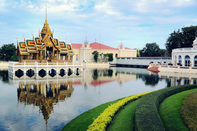 Ayutthaya’s Top Temple & Boat Tour From Bus Station - Wat Yai Chai Mongkhon’s tall chedi and reclining Buddha