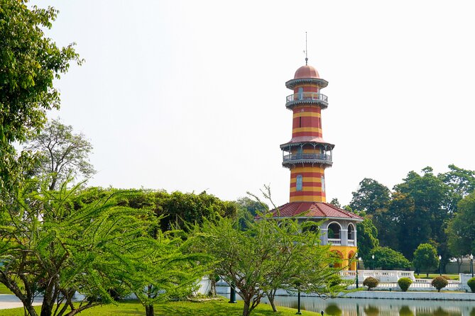 Ayutthaya Summer Palace and Temples Day Tour from Bangkok - Wat Mahathat and the Buddha head in tree roots
