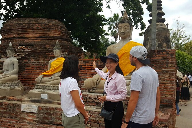 Ayutthaya Sunset Boat & UNESCO Temples: Multi-language private tour from Bangkok - Wat Mahathat and the Buddha head in the bodhi tree