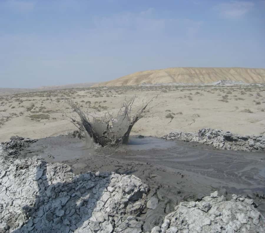 Baku:Gobustan Mud Volcanoes Temple & Entry tickets included - Yanar Dag: fire on the hillside
