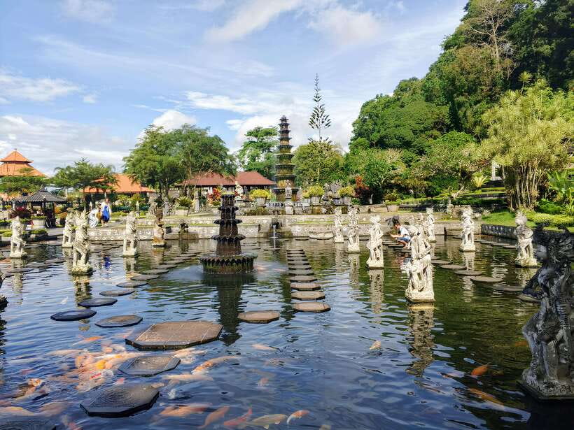 Bali: Lempuyang Temple, Tirta Gangga, and Temesi Waterfall … - Tirta Gangga’s ponds, statues, and fish