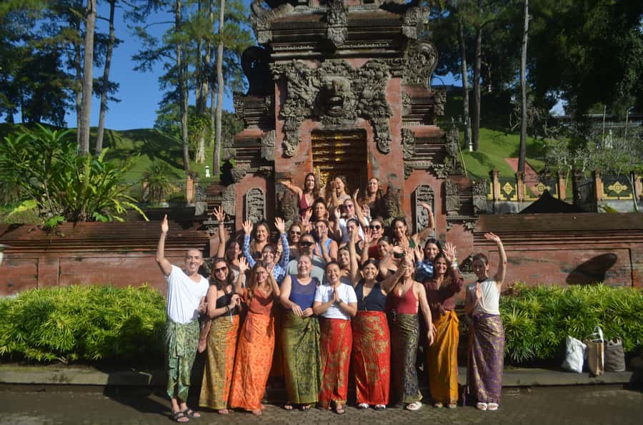 Bali: Purification at Tirta Empul Temple - Preparing the offerings and wetsuit