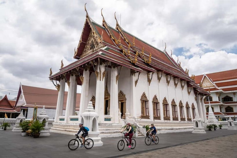Bangkok: Backstreets and Historic Temples Bike Tour - Crossing Rama VIII Bridge above the Chao Phraya