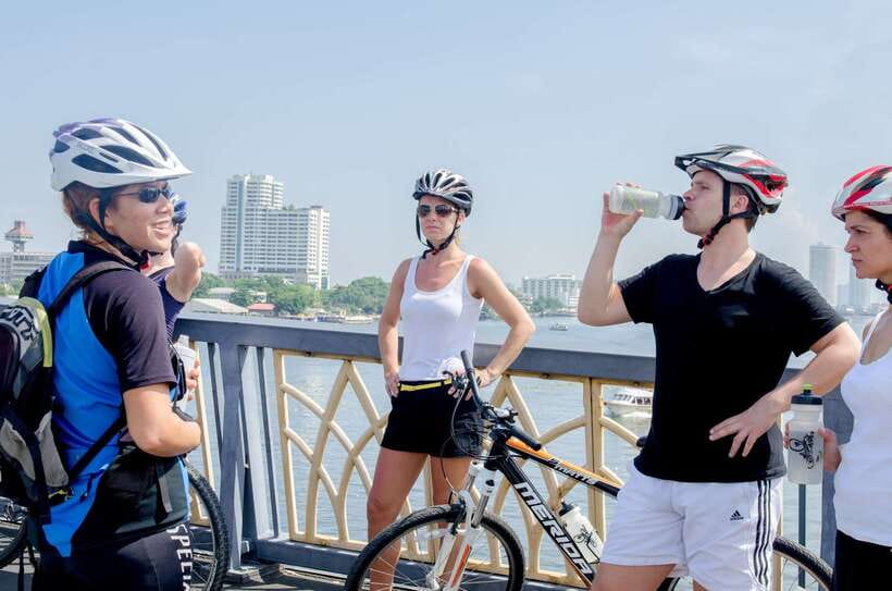 Bangkok: Backstreets and Historic Temples Bike Tour - A local ferry ride across the river