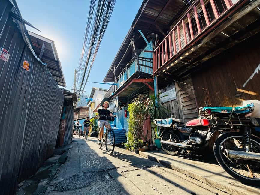 Bangkok: Temples, Canals & Local Life Bike Tour - A 15-kilometer ride through quiet lanes and canals