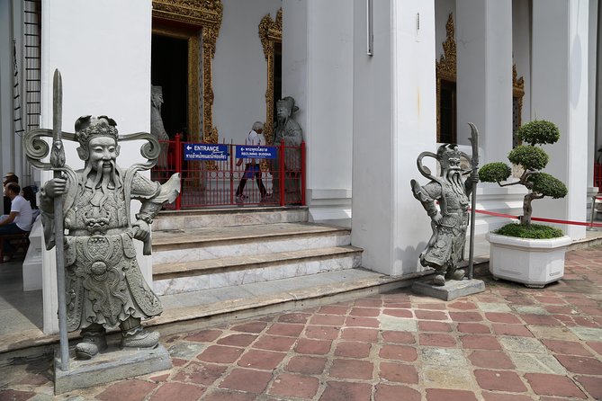 Bangkok Tuk Tuk Walk & Temple Tour With Wat Pho, Arun & Traimit - Getting around by tuk tuk, BTS, and boat