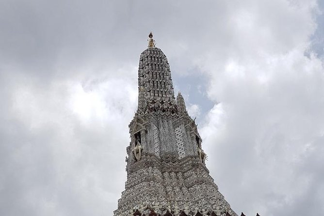 Bangkok Two Temple Tour: Wat Pho, Emerald Buddha & Grand Palace - Walking through Wat Pho and its reclining Buddha