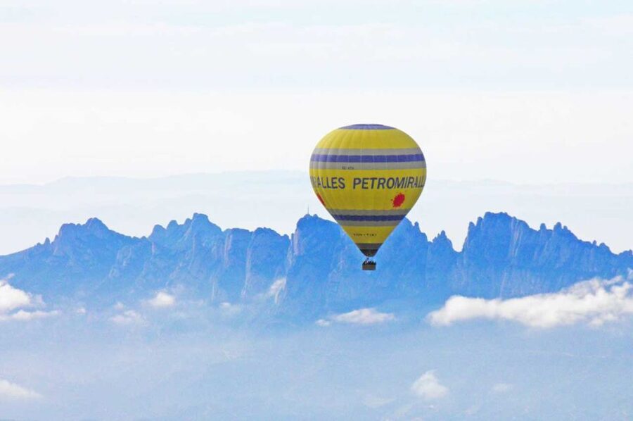 Barcelona: Montserrat Hot-Air Balloon & Monastery Experience - Riding the cable car to Montserrat Monastery