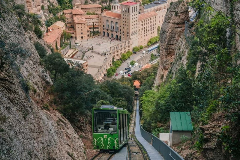 Barcelona: Montserrat Monastery and Natural Park Day Trip - Riding the Sant Joan funicular above the mountain