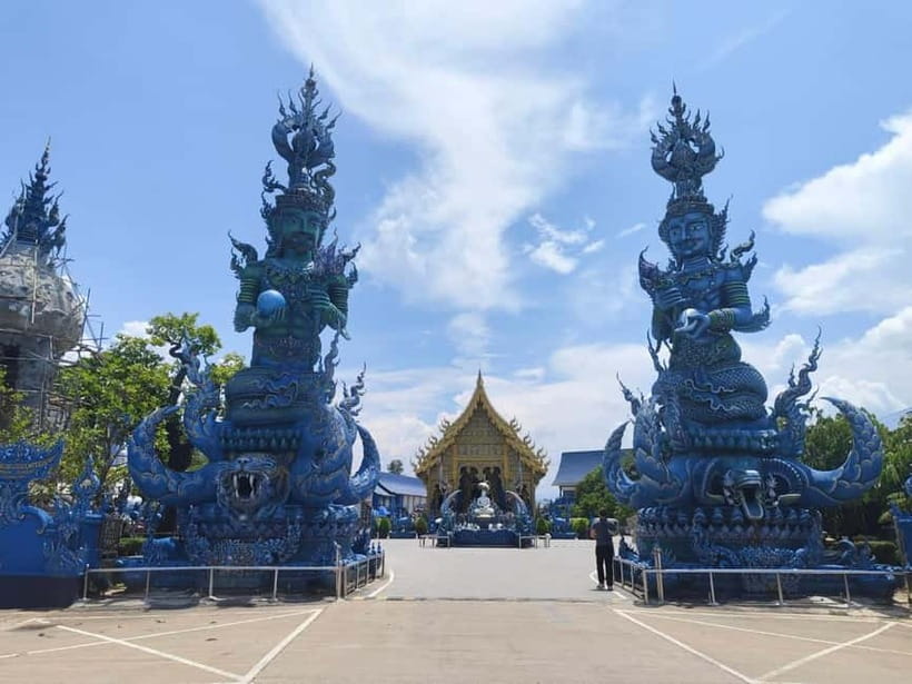 Chiang Mai: Chiang Rai Red, White, and Blue Temples day tour - Huay Pla Kang and the Red Temple description
