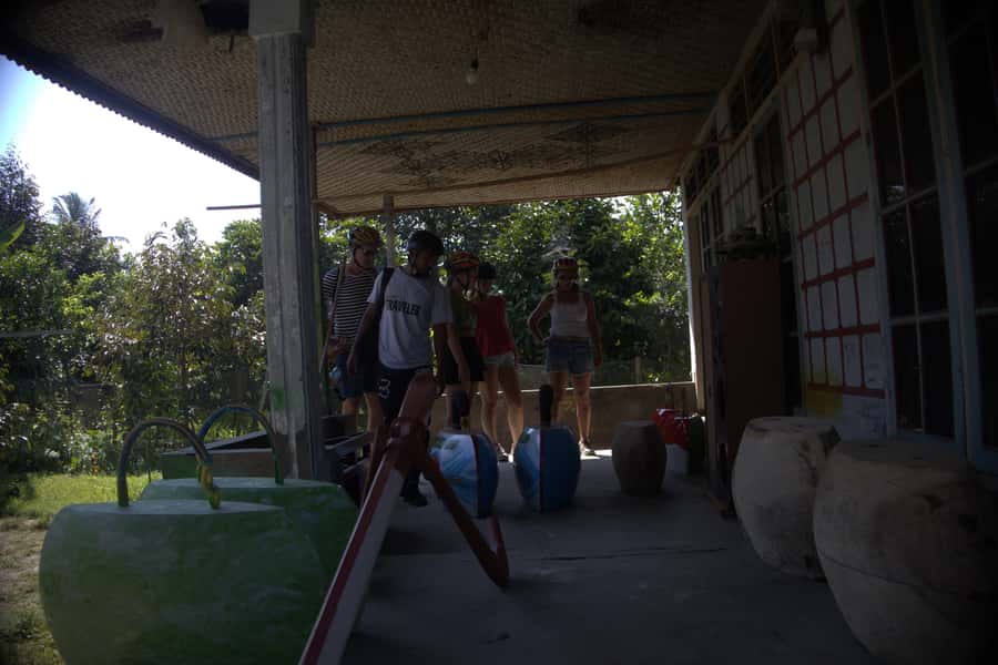 Countryside Bike Ride to Golong Village and Lingsar Temple - The cowbell makers and local food stop