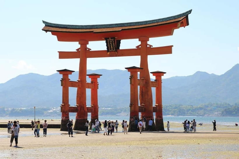 Day Trip to Hiroshima & Miyajima with Itsukushima Shrine - Taking the ferry toward the floating torii