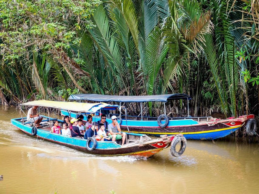 From HCMC: Mekong Delta and Vinh Trang Pagoda 1 day - The sampan through the nipa palm canals
