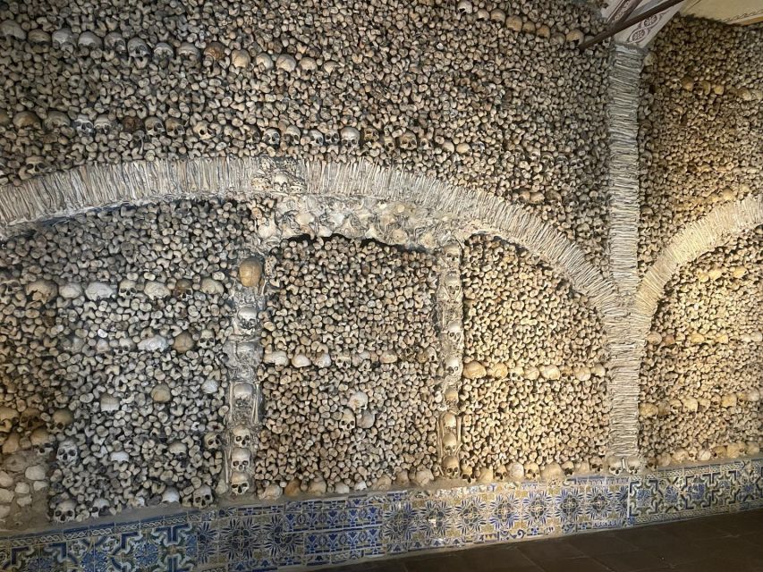 From Lisbon: Évora, Chapel of Bones, & Roman Temple Tour - Praça do Giraldo brings food and free time