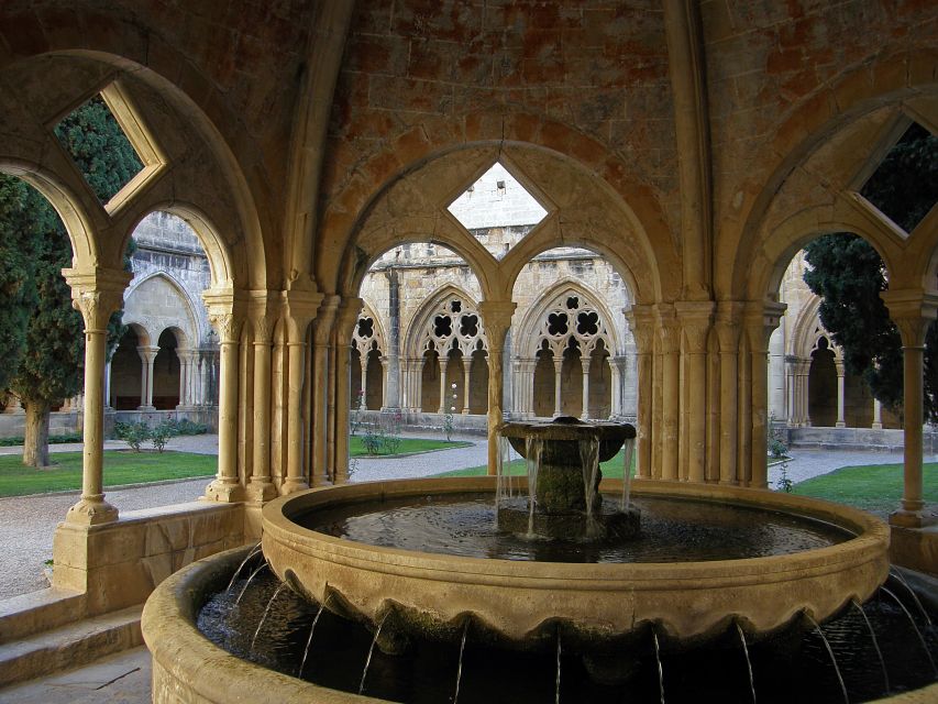 From Salou: Tour Poblet Monastery with hotel pickup - Exploring the monastery with the app