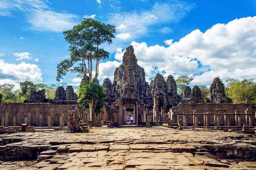 From Siem Reap: Angkor Wat Full-Day Private Tour & Sunrise - Bayon Temple and its famous stone faces