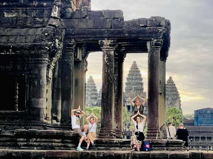 Full-Day Explore Angkor Temples Sunset Tour (with Lunch) - Ta Prohm and the trees reclaiming the ruins