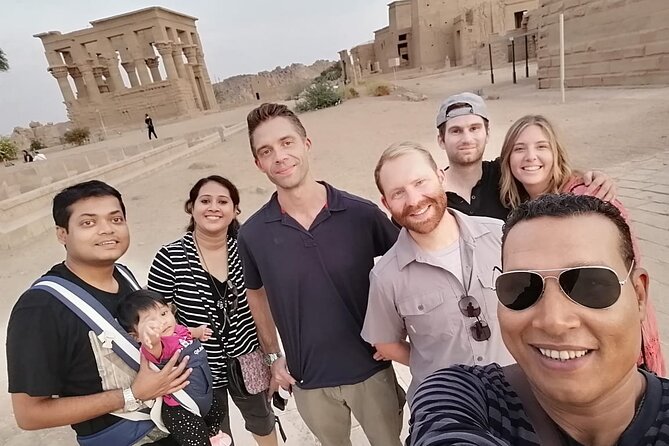 Full Day Guided Tour to Unfinished Obelisk, High Dam and Philae Temple by Boat - Reading the stone at the Unfinished Obelisk