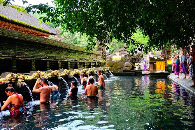 Half-Day Ubud Electric Cycling Tour to Tirta Empul Water Temple - Reaching Tirta Empul after the ride