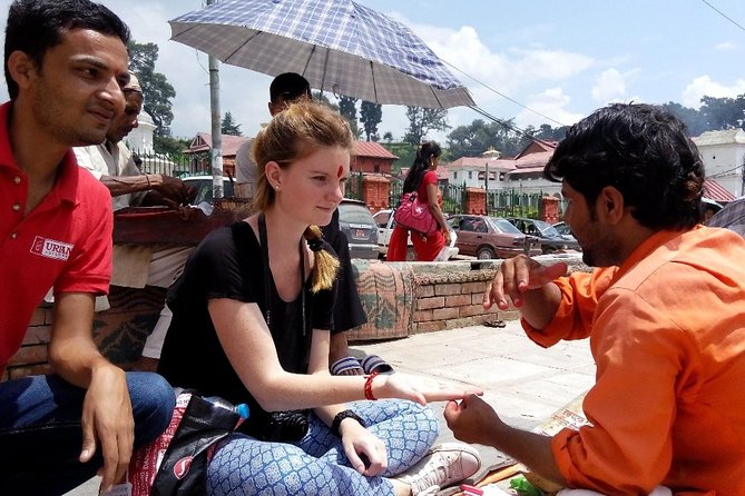 Kathmandu Spiritual Sites: Bodhnath & Pashupatinath Tour - The Aarati ceremony at sunset