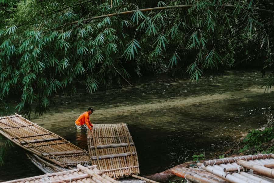 Khao Sok: Private Bamboo Rafting & Jungle Cave Temple Tour - Floating on a handcrafted bamboo raft