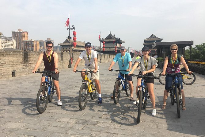 Mini Group Xian Day Tour to Terracotta Army, City Wall, Pagoda and Muslim Bazaar - The guides are the strongest part of the experience