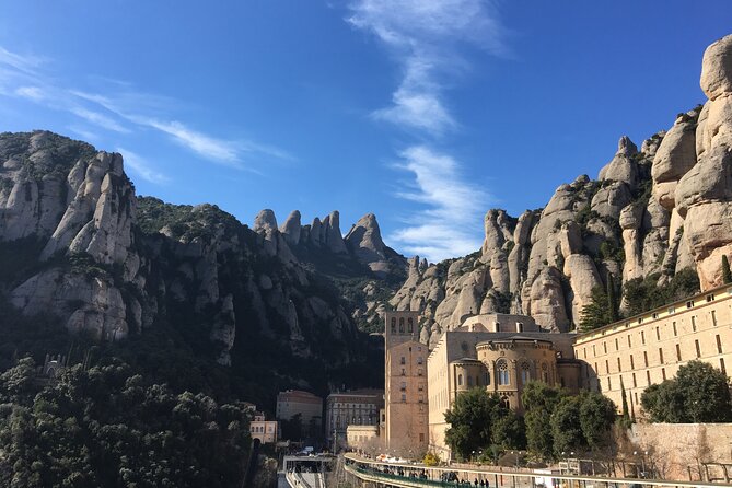 Montserrat Land of Shrines - One Day Small Group Hiking Tour from Barcelona - Riding the Sant Joan funicular to the high trails