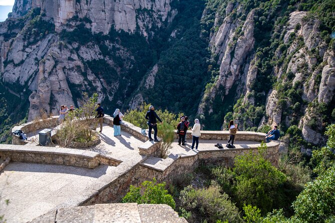 Montserrat Tour with Cogwheel Train, Monastery & Black Madonna - Entering the Montserrat monastery complex