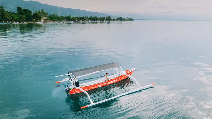 North Bali: Dolphin, Ulun Danu Temple, & Banyumala Waterfall - Lovina Beach at sunrise