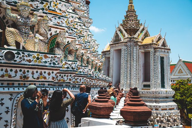 Private Tour: Half-day Grand Palace and Wat Arun by Boat - A longtail boat through Thonburi’s canals