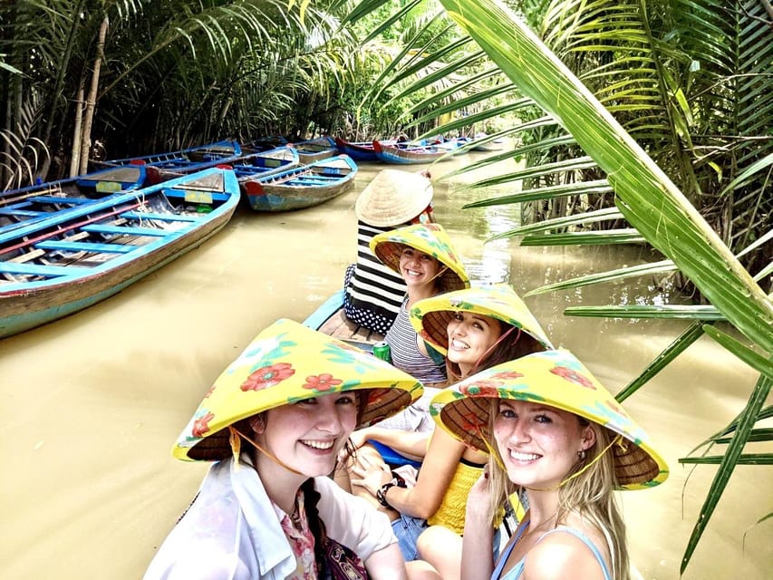 Private Tour to Mekong Delta & Vinh Trang Pagoda 1 Day - The sampan through coconut-lined canals