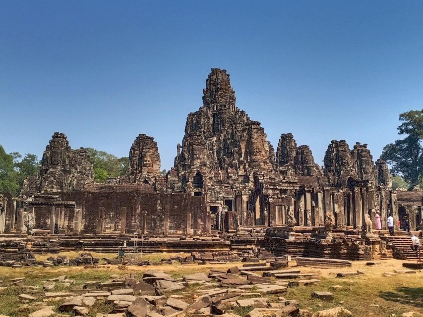 Sharing Trip to Angkor Temple with sunset - Ta Prohm after lunch, with roots over ancient stone