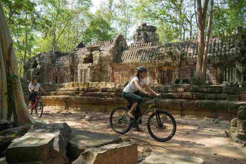 Siem Reap: Angkor Temples Off-Track Bicycle Tour - Preah Khan, broad corridors and carved stone