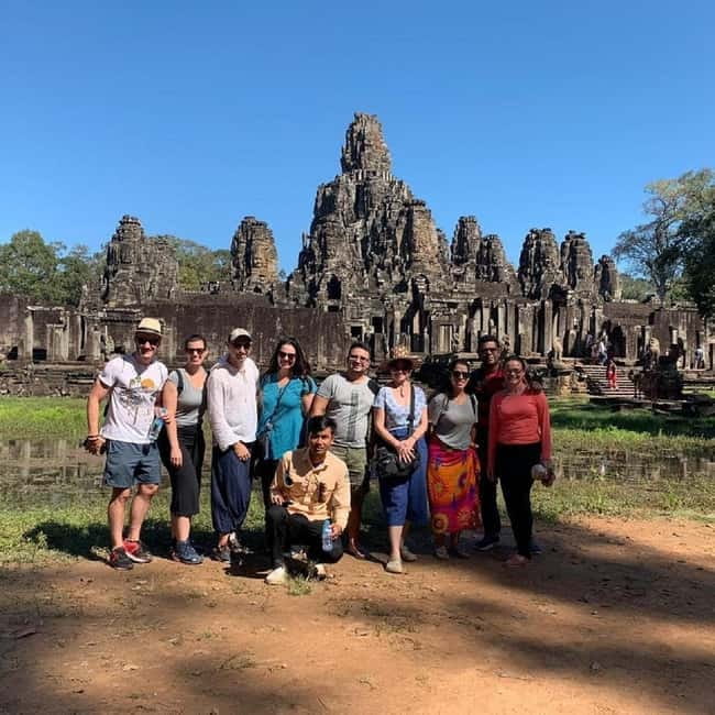 Siem Reap: Angkor Wat Small-Group Day Tour - Angkor Thom, its gates, and the stone faces of Bayon