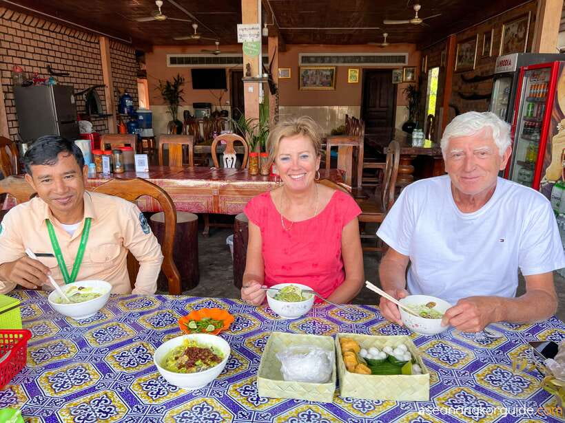 Siem Reap: Angkor Wat Sunrise and Market Tour by Jeep - Victory Gate gives Angkor Thom a grand entrance