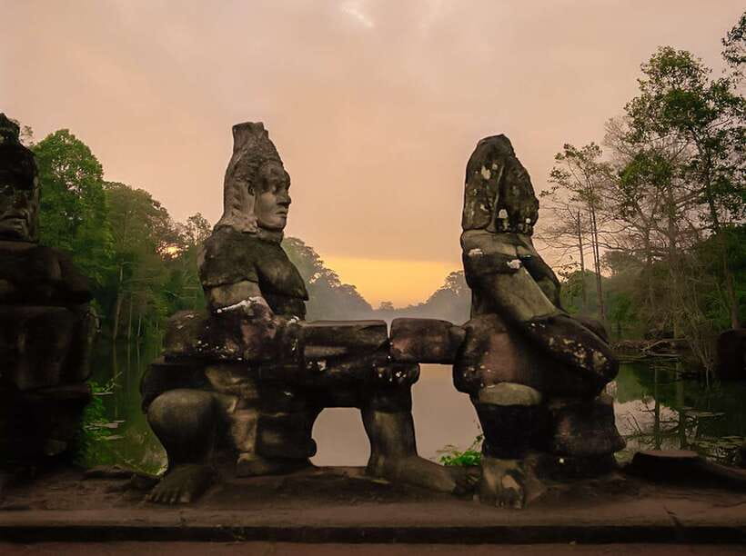 Siem Reap: Angkor Wat Sunrise or Sunset Guided Tour - Tonle Om Gate and the smiling faces of Bayon