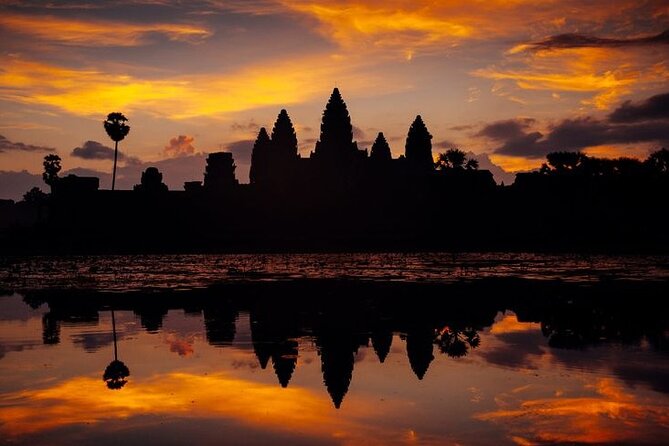 Siem Reap Tour: Angkor Wat Sunrise, Bayon, Ta Prohm, Banteay Srei - Bayon and its many stone faces