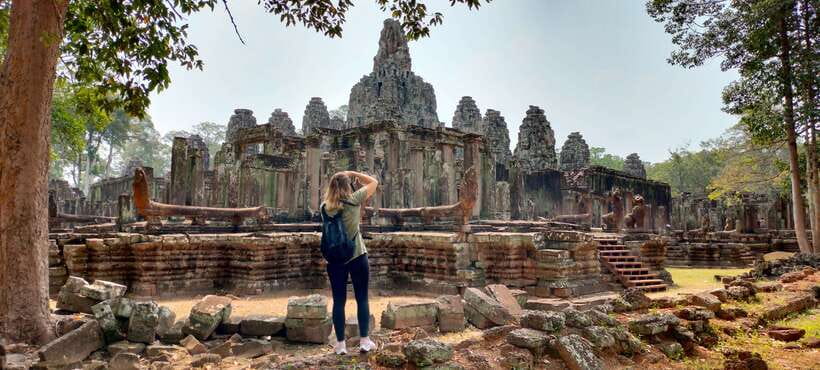 Siem Reap Tour Guide: Angkor Wat Sunrise Tour & Beng Mealea - Bayon and the many stone faces, 1 hour