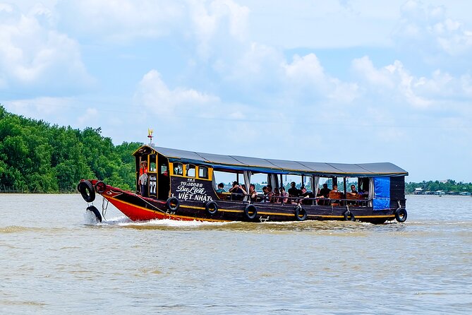 Small-Group Mekong Delta Day Trip: Boat Ride, Cottages & Pagoda - Ben Tre, coconut candy and local products