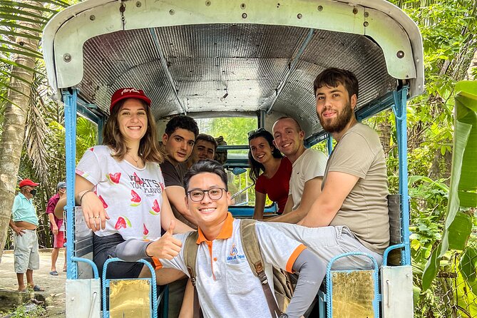 Small-Group Mekong Delta Day Trip: Boat Ride, Cottages & Pagoda - The narrow boat through the canals