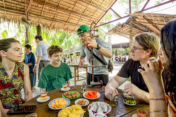 Small-Group Mekong Delta Day Trip: Boat Ride, Cottages & Pagoda - Traditional songs, village culture and the human side of the tour