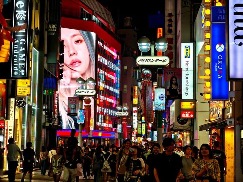 Tokyo: Evening Tour - Temples, Neon Streets & Culture - Shibuya Crossing under the billboards